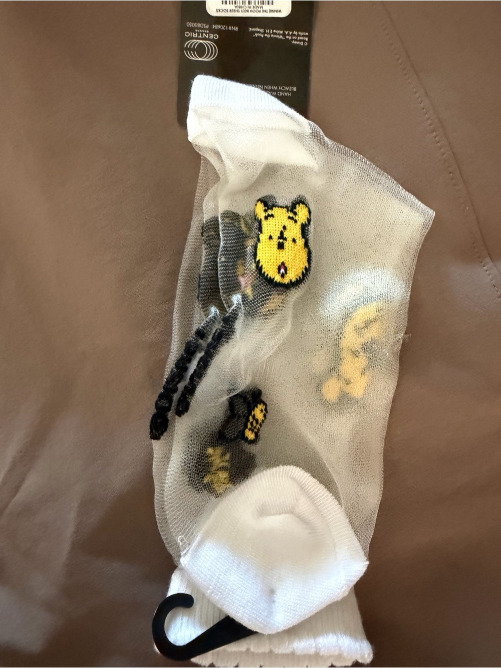 Disney White Sheer Socks with Yellow & Black Winnie the Pooh Accents - Picture 2 of 9